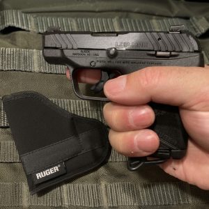 Close-up view of the blued alloy steel slide and integral low-profile sights