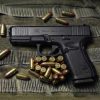 Glock 19 gen 5 on top of a military dress background