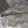 Mossberg Patriot Predator 450 Bushmaster Bolt-Action Rifle side profile resting on a neutral background
