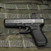 Glock 20 Gen 5 MOS 10mm semi-auto pistol side profile resting on a neutral background