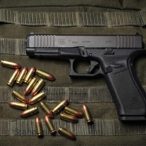 Glock 17 Gen 6 9mm semi-auto pistol side profile resting on a neutral background